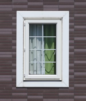 modern window with brick wall background